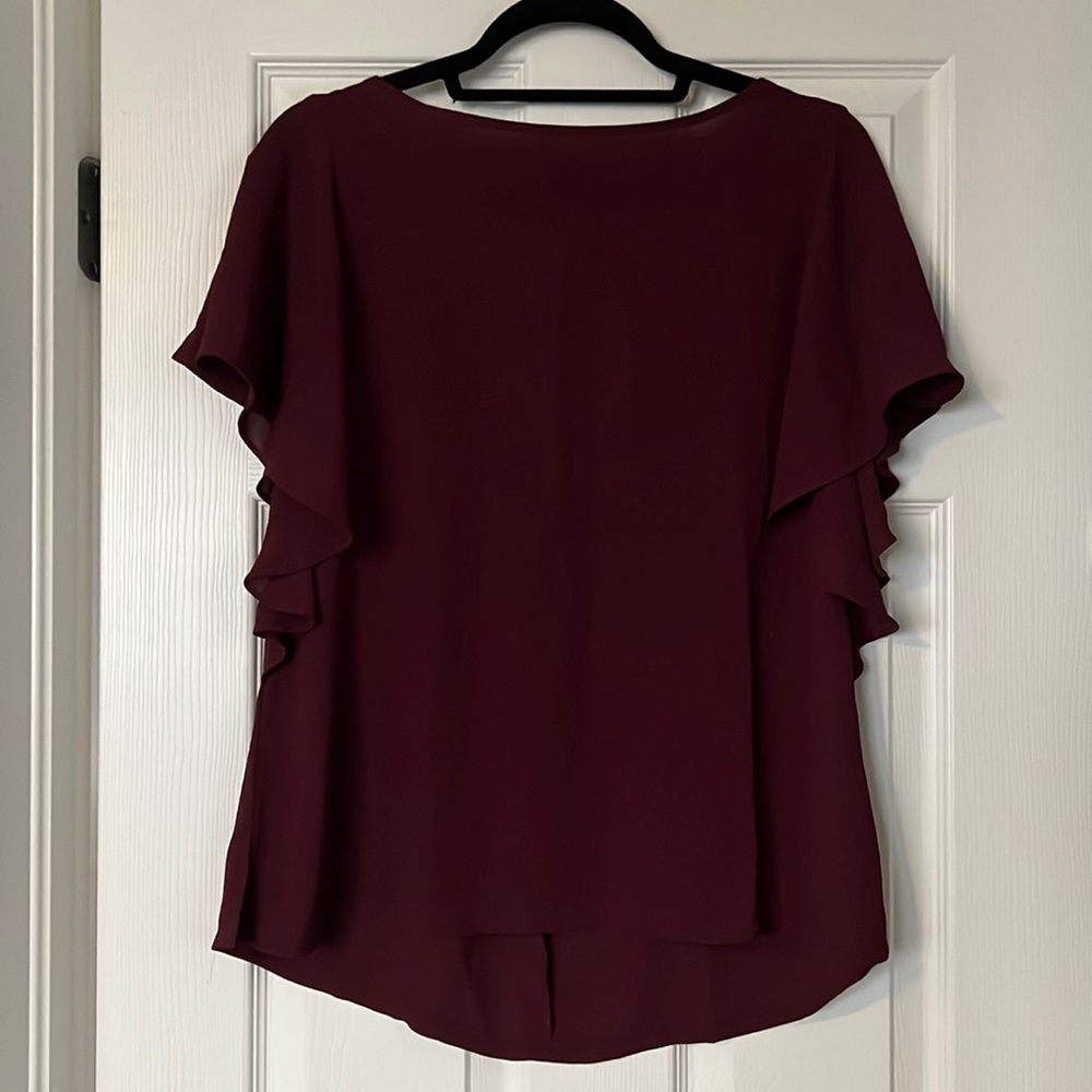 Flutter sleeve back tie blouse